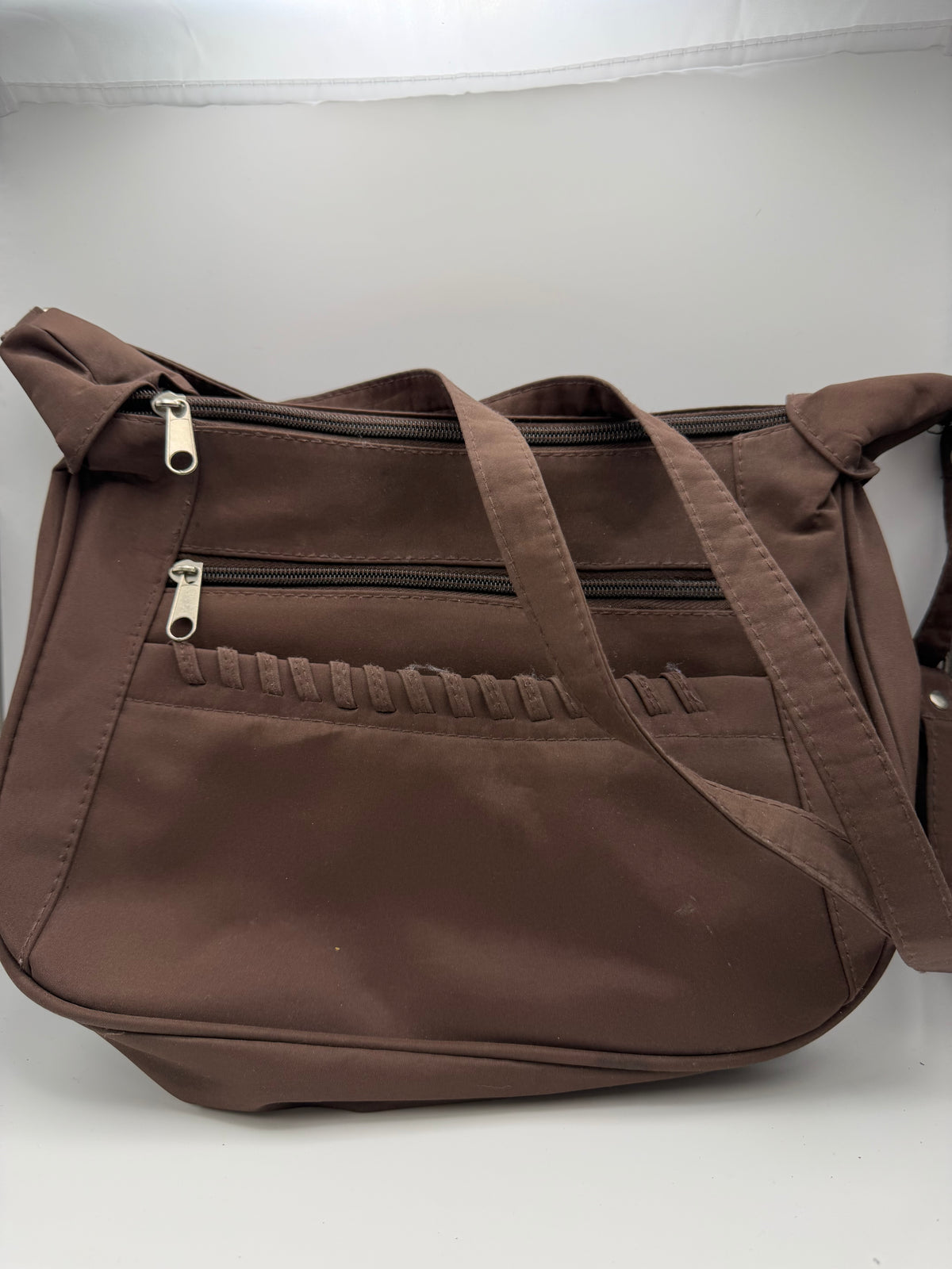 Brown handbag with adjustable strap