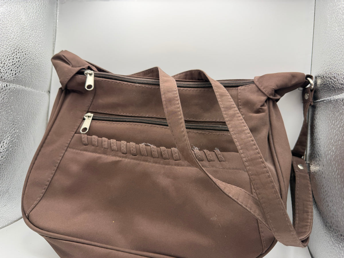 Brown handbag with adjustable strap