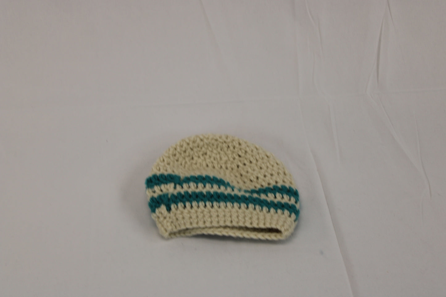 Infant knitted stocking cap, beige, one size