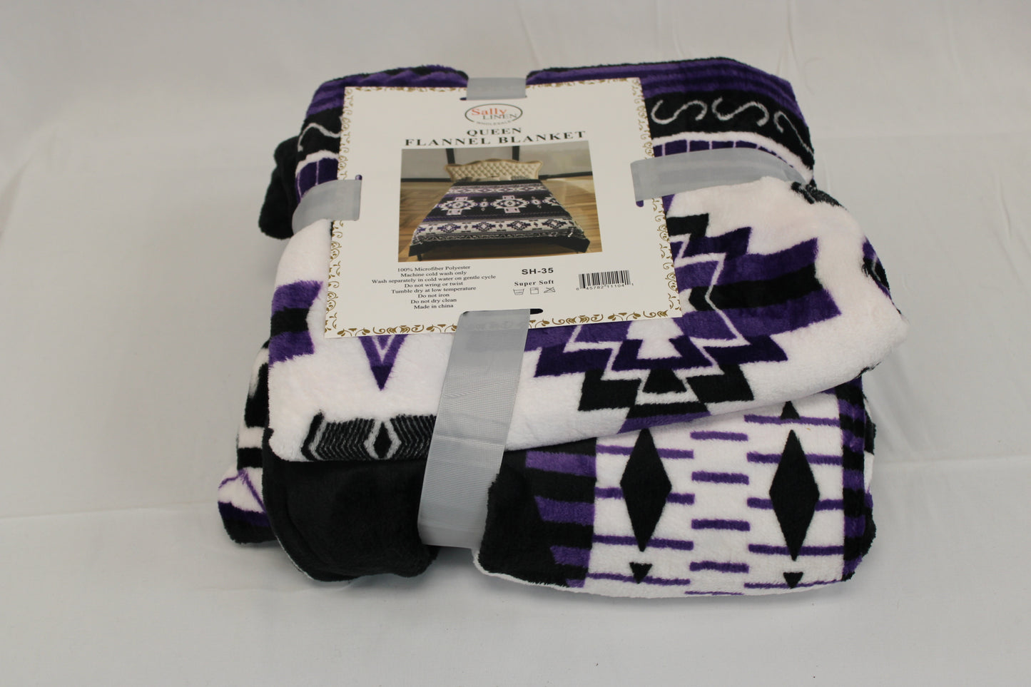 Tribal patterned Queen fleece blanket, purple/blk