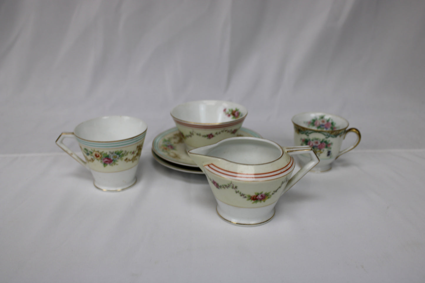 Noritake antique mismatched Japanese Tea set, 2 saucers, 3 cups, 1 cream bowl