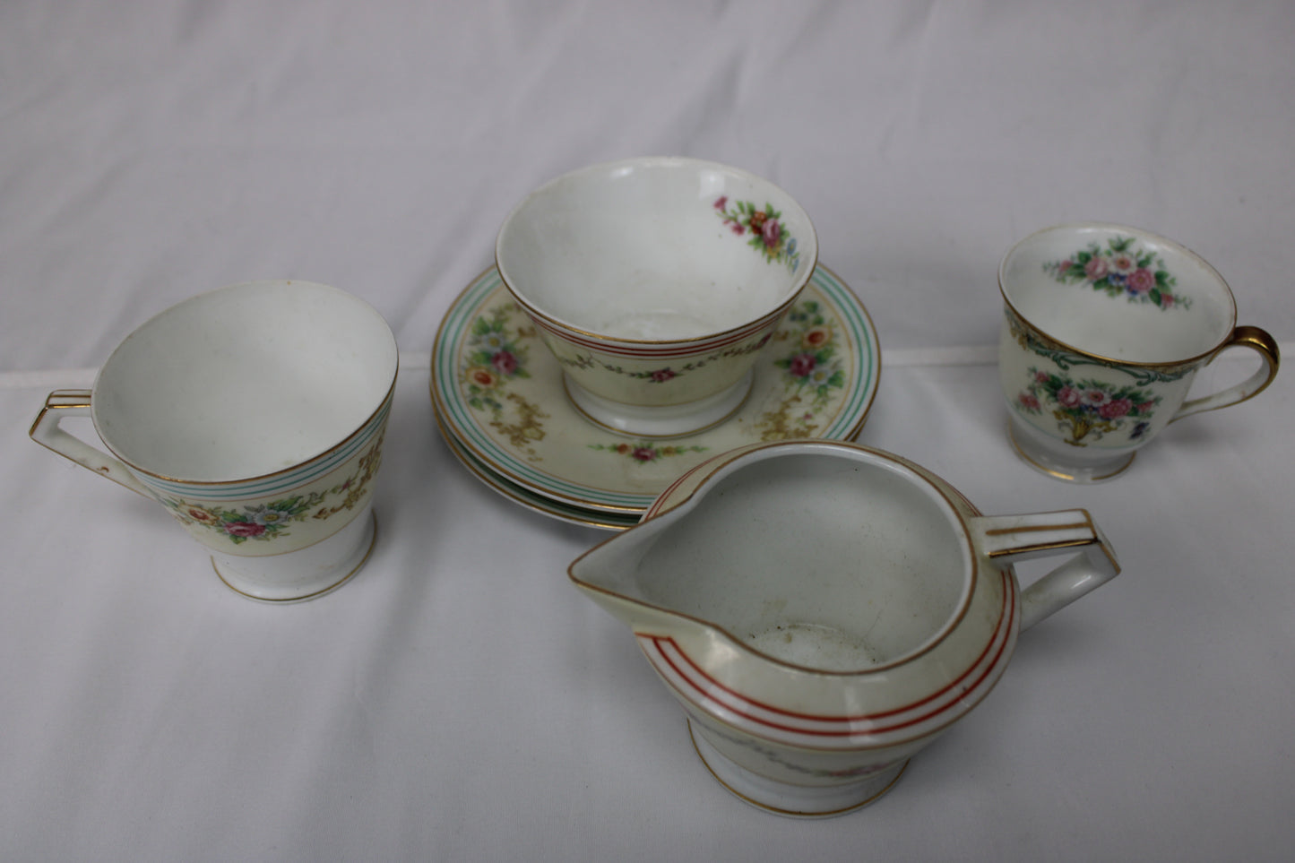 Noritake antique mismatched Japanese Tea set, 2 saucers, 3 cups, 1 cream bowl