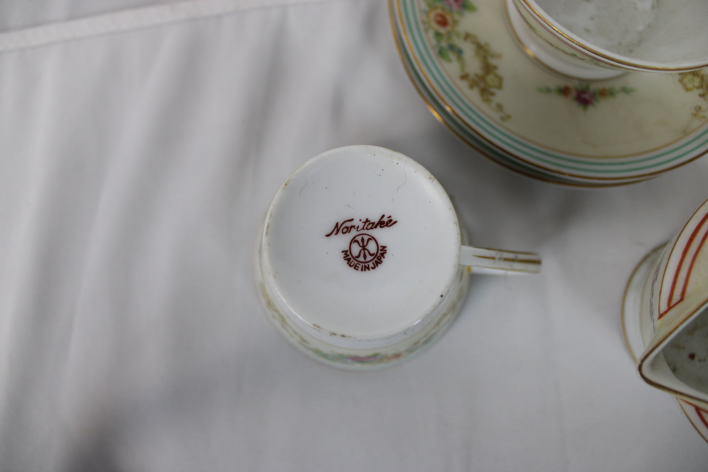Noritake antique mismatched Japanese Tea set, 2 saucers, 3 cups, 1 cream bowl