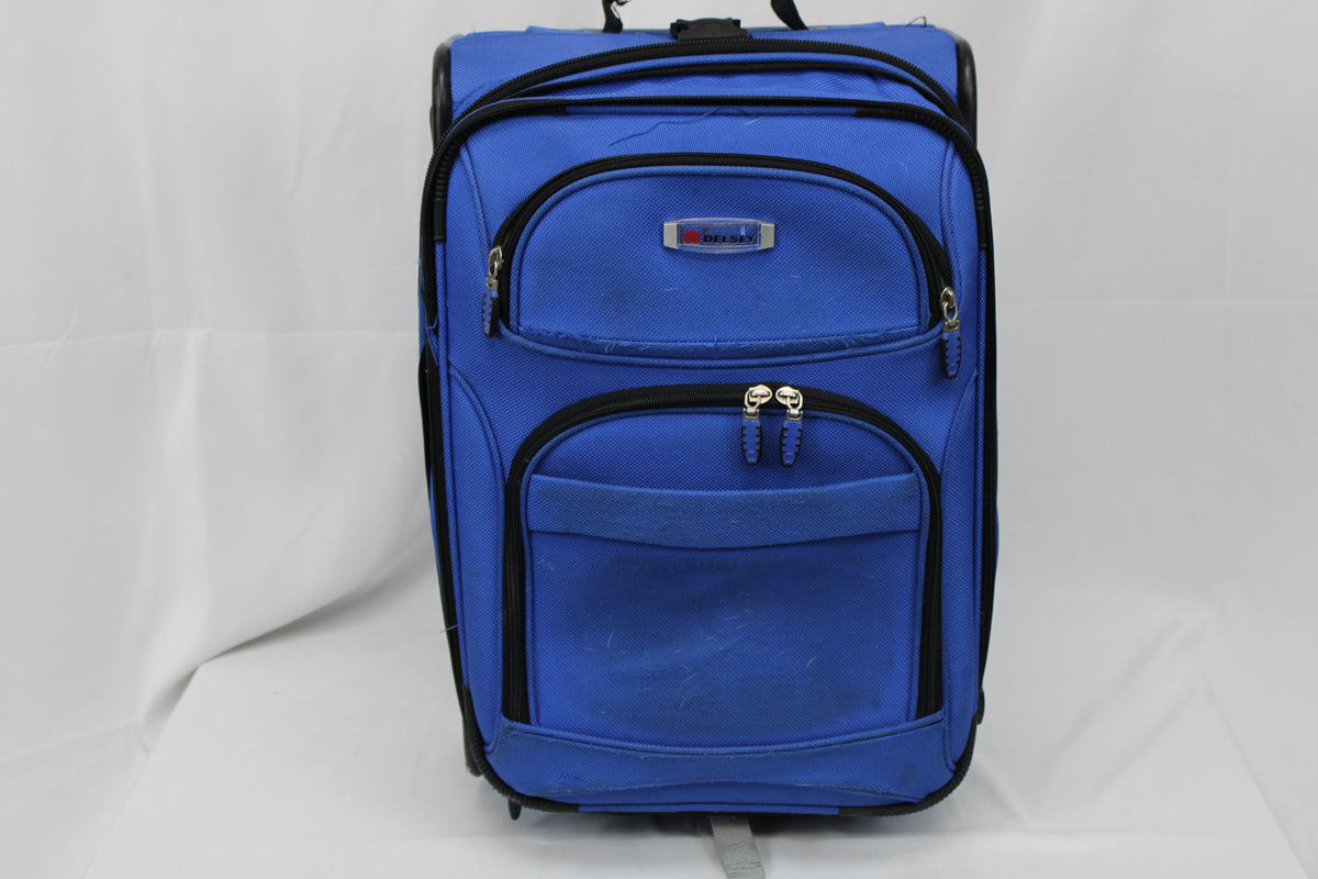Delsey carry on sized suitcase with three external pockets, royal blue