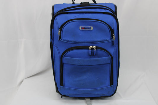 Delsey carry on sized suitcase with three external pockets, royal blue
