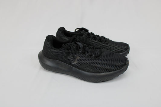 Under Armour Charged Surge 4 running shoe, black/black, Youth 7