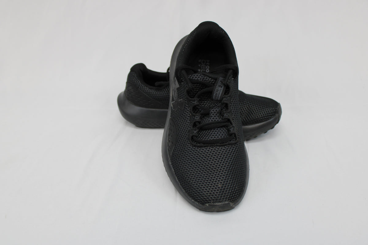 Under Armour Charged Surge 4 running shoe, black/black, Youth 7