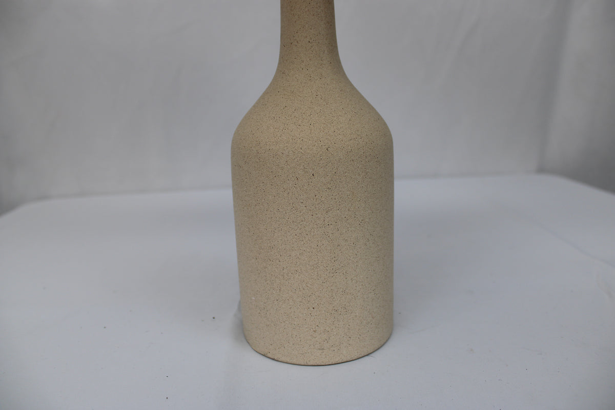 8 inch tall terra cotta style ceramic vase with artificial fern