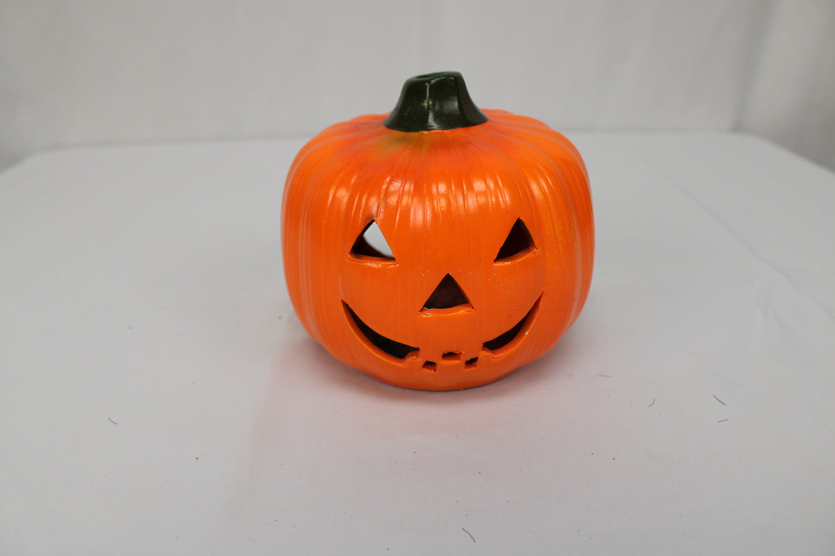 Hand painted ceramic jack-o-lantern candle holder